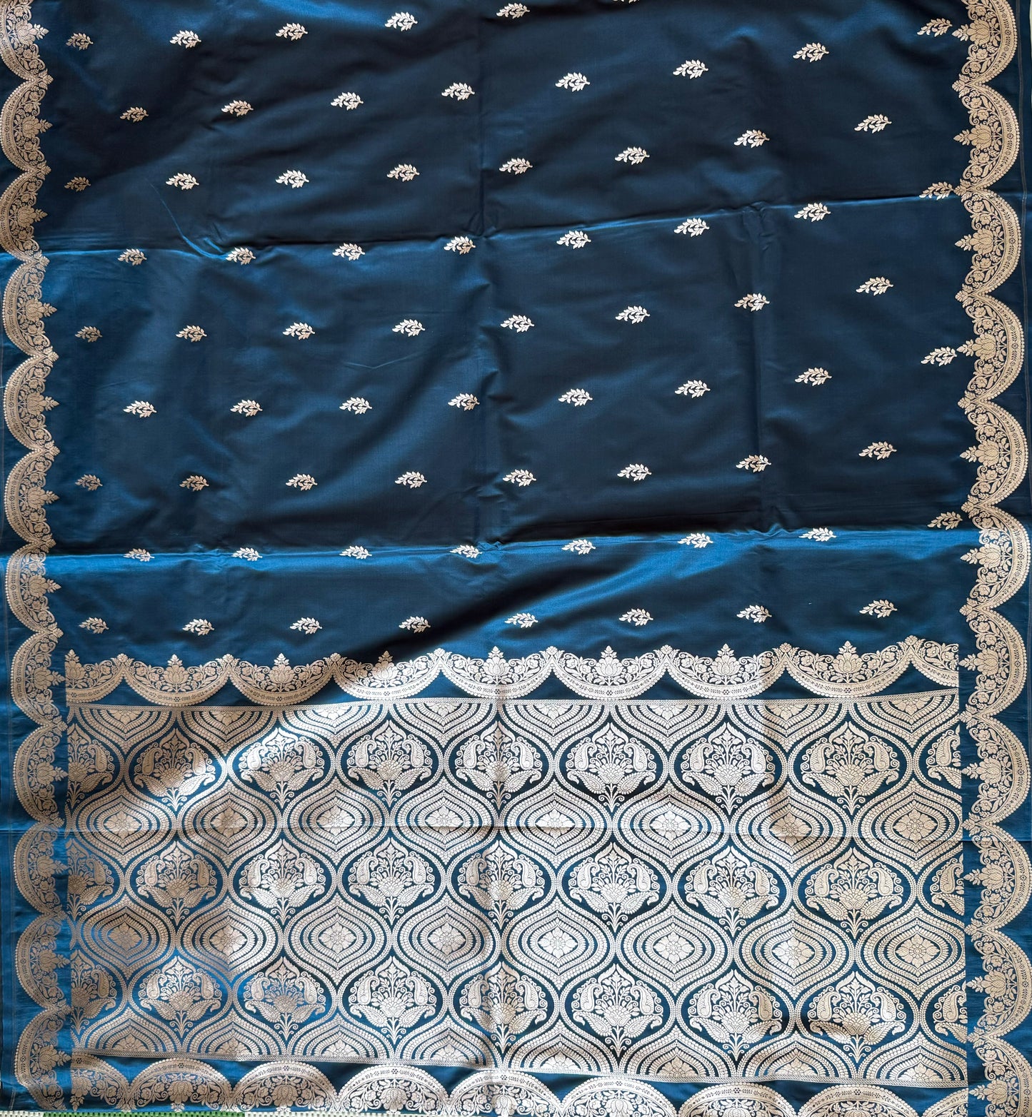 Teal Blue Banarasi work Floral Motifs and Scallop Border with Rich Pallu and blouse ”