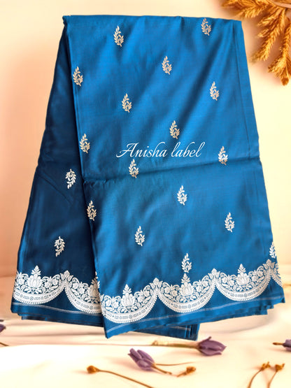 Teal Blue Banarasi work Floral Motifs and Scallop Border with Rich Pallu and blouse ”
